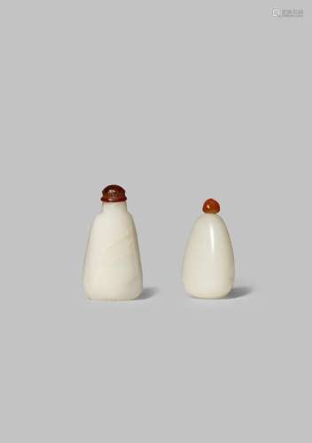 TWO CHINESE WHITE JADE SNUFF BOTTLES QING DYNASTY One of pebble form, the other with an irregular