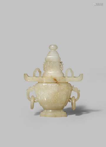 A CHINESE PALE YELLOWISH JADE HANGING VASE 18TH/19TH CENTURY The flattened body decorated with