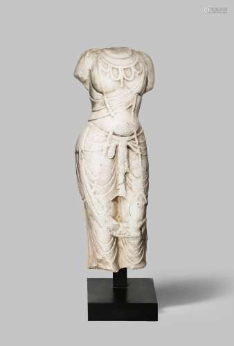 A MASSIVE CHINESE MARBLE TORSO OF A BODHISATTVA TANG DYNASTY 618-907 AD The standing figure