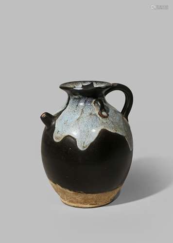 A CHINESE PHOSPHATIC GLAZED EWER TANG DYNASTY 618-907 AD With an ovoid brown glazed body with