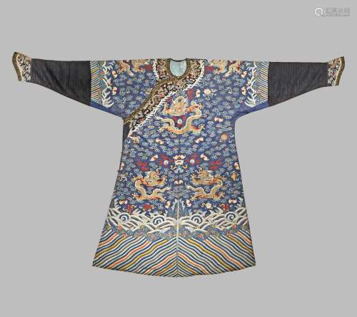 A CHINESE BLUE-GROUND SILK KESI 'NINE DRAGON' ROBE, JIFU 19TH CENTURY Woven with silk and gold