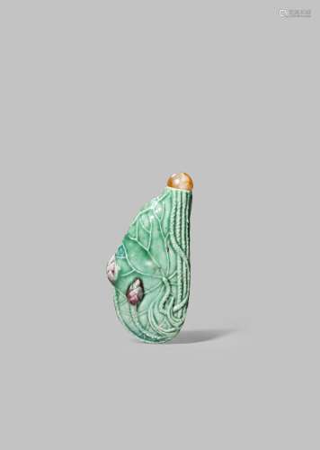 A CHINESE PORCELAIN 'LOTUS LEAF' SNUFF BOTTLE 19TH CENTURY Crisply moulded with trailing stems, buds