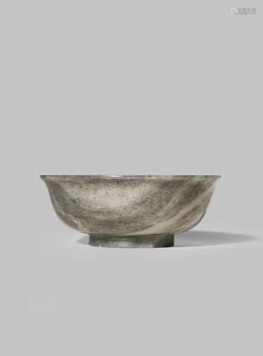 A CHINESE BLACK AND WHITE JADE BOWL SIX CHARACTER QIANLONG MARK AND OF THE PERIOD 1736-95 With an