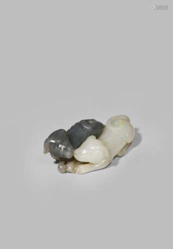 A CHINESE WHITE AND GREY JADE CARVING OF TWO HOUNDS QING DYNASTY Finely carved with the two dogs
