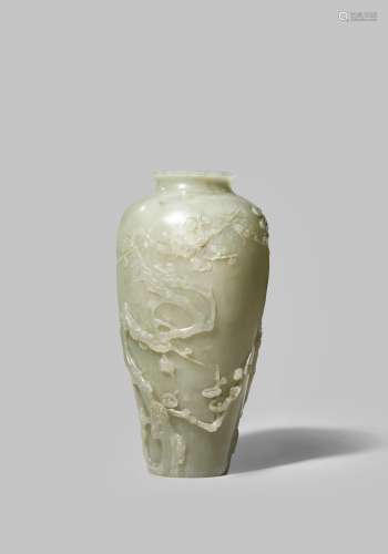 A FINE CHINESE PALE CELADON JADE 'PRUNUS' VASE QIANLONG 1736-95 With a tapering ovoid body carved in