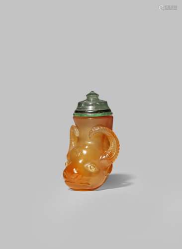 A CHINESE AGATE 'BUFFALO HEAD' SNUFF BOTTLE QING DYNASTY With articulated eyes and long ribbed horns
