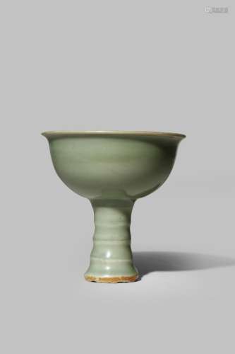 A CHINESE LONGQUAN CELADON STEM CUP SONG/YUAN DYNASTY The plain U-shaped body with an everted rim,