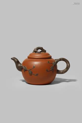 A CHINESE YIXING TEAPOT AND COVER LATE QING DYNASTY The spout, handle and finial in darker clay