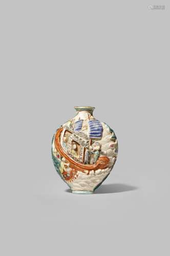 A CHINESE FAMILLE ROSE MOULDED PORCELAIN SNUFF BOTTLE LATE 18TH/ EARLY 19TH CENTURY With a