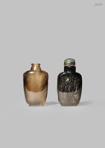 A CHINESE HAIR CRYSTAL SNUFF BOTTLE AND A SMOKY CRYSTAL SNUFF BOTTLE 19TH CENTURY The former with