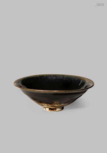 A CHINESE BLACK GLAZED BOWL SONG DYNASTY 960-1279 The conical body coated with a black glaze with