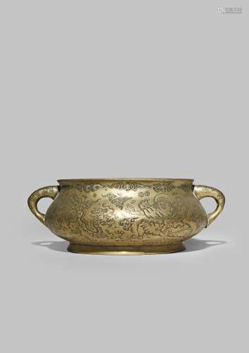 A CHINESE BRONZE INCENSE BURNER QING DYNASTY The compressed circular body with loop handles and a