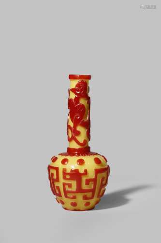 A CHINESE BEIJING GLASS YELLOW AND RED OVERLAY BOTTLE VASE 18TH CENTURY Carved with an archaistic