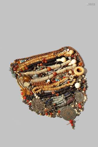 A COLLECTION OF TIBETAN BEADS, MALA 19TH CENTURY Comprising: seven rosaries, three metal amulets,