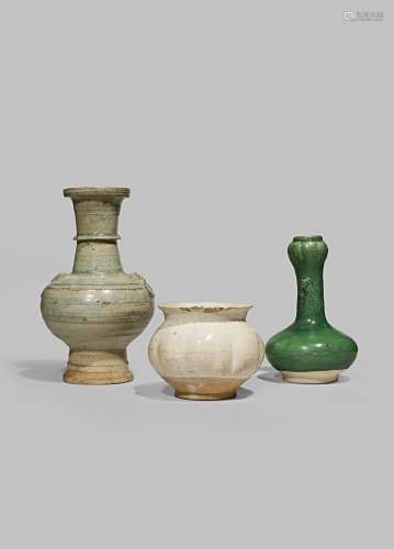 THREE CHINESE POTTERY VASES TANG DYNASTY AND LATER Comprising: a celadon vase moulded with