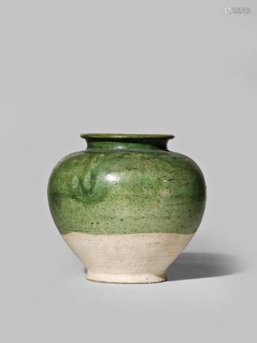 A CHINESE GREEN GLAZED OVOID VASE TANG DYNASTY 618-907 AD The ovoid body with green glaze applied to