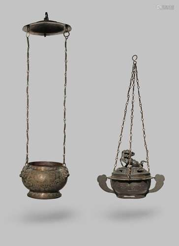 TWO CHINESE COPPER ALLOY HANGING INCENSE BURNERS 19TH CENTURY The larger with three pairs of