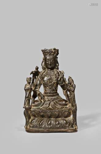 A CHINESE BRONZE FIGURE OF TARA EARLY MING DYNASTY Wearing long robes with ribbons to the sleeves