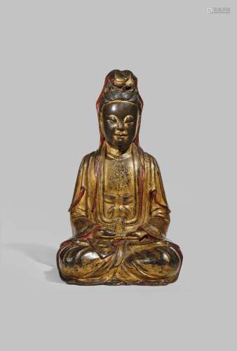 A CHINESE LACQUERED BRONZE FIGURE OF GUANYIN LATE MING DYNASTY Seated in vajraparyankasana,