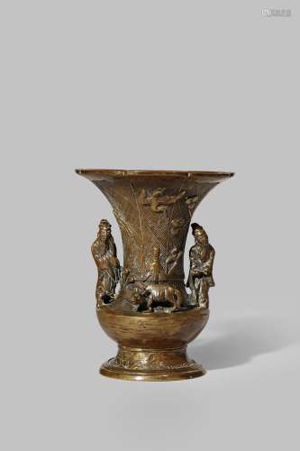 A CHINESE BRONZE VASE LATE MING DYNASTY The flared neck cast with pines, rohdea and a crane, the