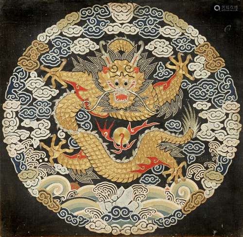 A CHINESE EMBROIDERED SILK PANEL QING DYNASTY Decorated with a roundel depicting a confronting