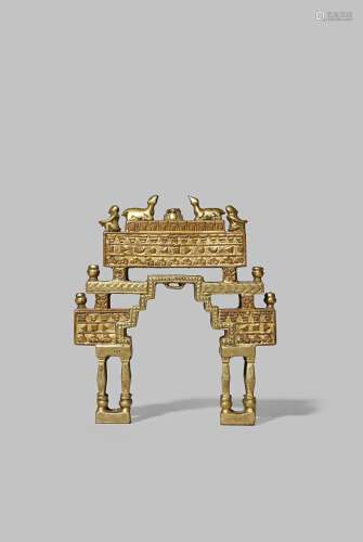 AN INDIAN GILT BRONZE ORNAMENT 19TH/20TH CENTURY Formed as a gate supported on eight columns,