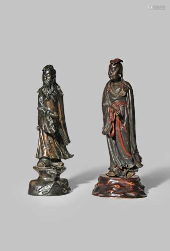 TWO CHINESE BRONZE FIGURES OF LU DONGBIN LATE MING/QING DYNASTY Both standing, wearing headdresses