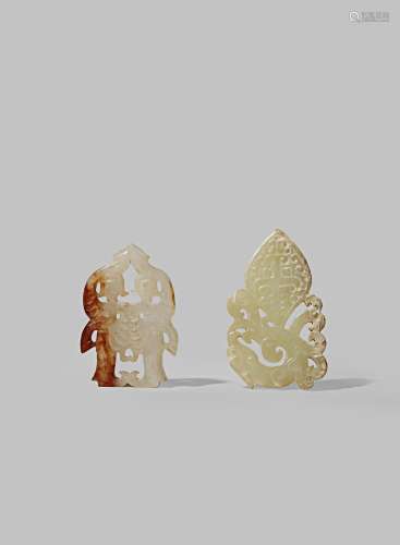 TWO CHINESE JADE PENDANTS QING DYNASTY OR EARLIER One in white and brown jade carved as two