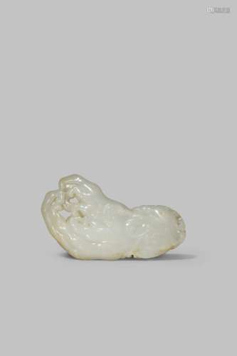 A CHINESE WHITE JADE CARVING OF A FINGER CITRON QING DYNASTY OR LATER Of a flattened form with a