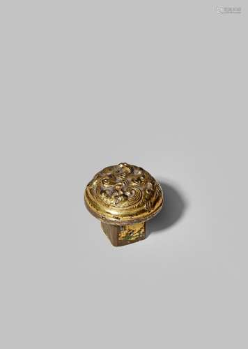 A CHINESE GILT BRONZE AXLE FINIAL HAN DYNASTY 206BC - 220AD Cast with two stylised intertwined