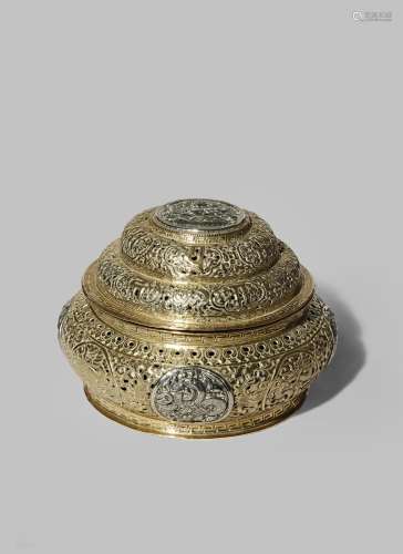 A TIBETAN OR NEPALESE SILVER AND GILT METAL RETICULATED INCENSE BURNER AND COVER 19TH CENTURY With a