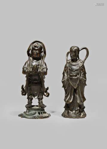 TWO CHINESE BRONZE FIGURES 17TH CENTURY Each standing, wearing robes with ribbons, the female