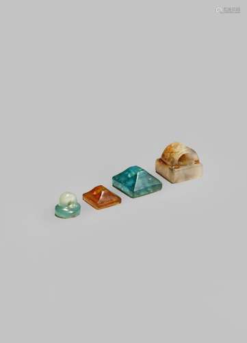 FOUR SMALL CHINESE SEALS HAN DYNASTY OR LATER One jade, with a square body and a loop handle with
