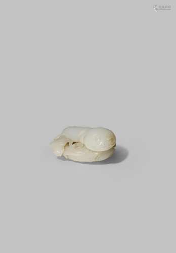 A CHINESE WHITE JADE CARVING OF TWO CATFISH QING DYNASTY Carved as two fish joined at the belly,