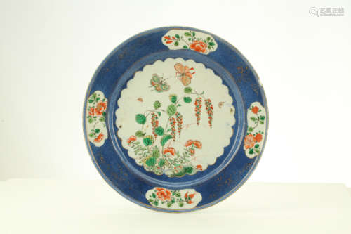 A PAIR OF CHIENSE POWDER BLUE GROUND FAMILLE VERTE DISHES. Qing Dynasty, Kangxi era. Decorated