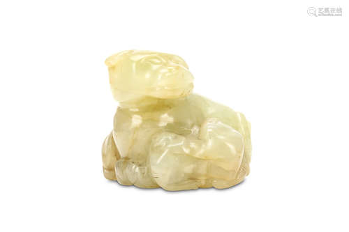 A CHINESE JADE ‘LION AND CUBS’ CARVING. Early Qing Dynasty, or earlier. Seated with legs tucked