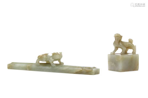 A CHINESE JADE SCROLL WEIGHT AND SEAL. Qing Dynasty. Each surmounted by a Buddhist lion dog, the