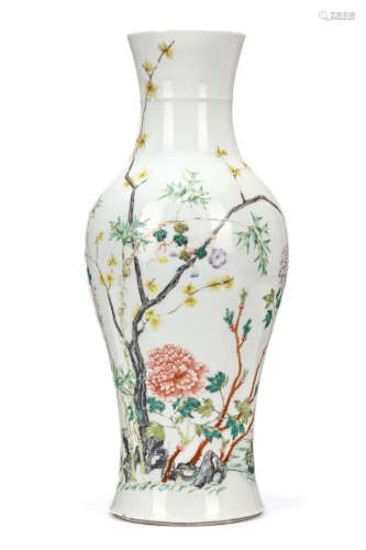 A CHINESE FAMILLE ROSE 'FLOWERS' VASE. Qing Dynasty. Decorated with bamboo, prunus and flowers
