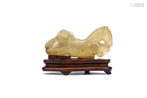 A CHINESE AGATE 'HORSE AND MONKEY' CARVING. Qing Dynasty, 18th Century. The horse seated with the
