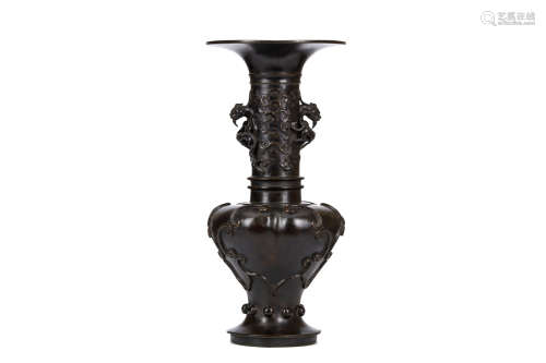 A LARGE CHINESE BRONZE PHOENIX-TAIL VASE. 17th Century. The baluster body divided into three