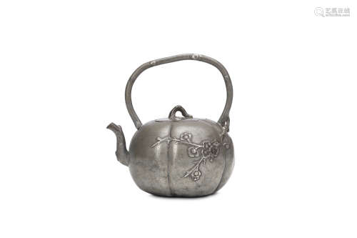 A CHINESE PEWTER 'PRUNUS' TEAPOT AND COVER. Qing Dynasty. The body formed as a melon with a ring