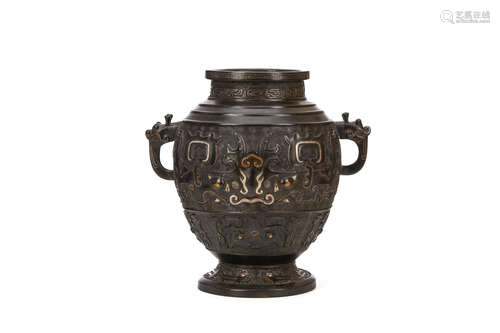 A CHINESE GOLD AND SILVER INLAID ARCHAISTIC BRONZE VASE, LEI. Ming Dynasty. The urn-shaped wine