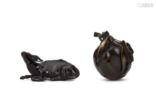 TWO CHINESE BRONZE WATER DROPPERS. 17th Century. One formed as a seated buffalo, the other as a