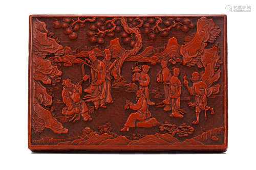 A  CINNABAR LACQUER BOX. Early 20th Century. Of rectangular form, the top depicting a scene of