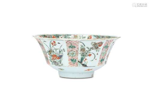 A CHINESE WUCAI BOWL. Qing Dynasty, Kangxi era. Rising to an everted rim from a cylindrical foot,