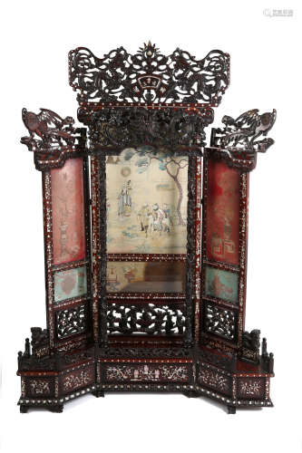 A CHINESE EMBROIDERY TRIPTIC IN MOTHER-OF-PEARL INLAID WOOD FRAME. Qing Dynasty. The central panel
