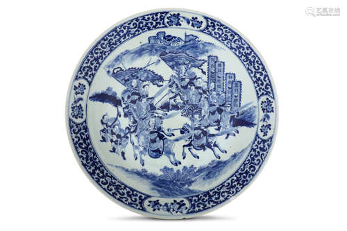 A LARGE CHINESE BLUE AND WHITE 'WARRIORS' CHARGER. Qing Dynasty, 19th Century. The central roundel