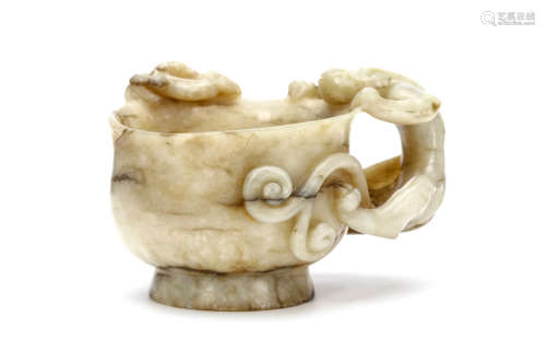 A CHINESE JADE CUP WITH CHILONG HANDLE. Qing Dynasty, 18th Century. The cup with rounded sides