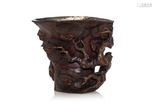 A CHINESE CARVED BAMBOO ‘PINE TREE’ LIBATION CUP. 17th Century. Naturalistically carved as a section
