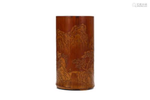 A CHINESE BAMBOO LIU QING ‘LANDSCAPE’ BRUSH POT. Qing Dynasty, 18th / 19th Century. Carved in liu